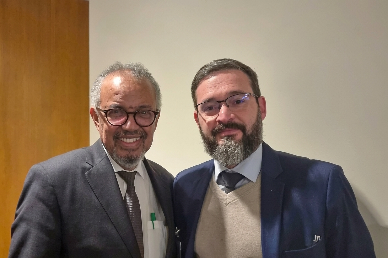 André Faro ao lado do diretor-geral da OMS, Tedros Adhanom.